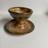 Small Handmade pottery chalice and plate beige with green rim