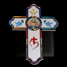 Close-up of laser-engraved Jesus crowned with thorns in vibrant mirrored acrylic medallion on white cross, sparkling Sacred Heart faith piece