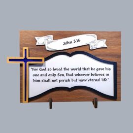 Close-up of blue mirrored acrylic cross on handmade John 3:16 wooden scripture plaque in walnut and maple