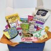 Healthy snack box care package with mug.